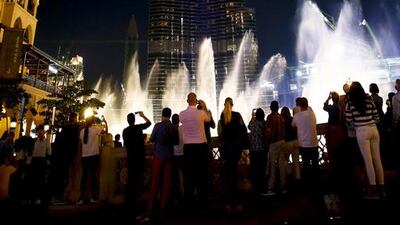 Burj Khalifa is lit blue, white and red – the colours of the French flag – following the attacks in Paris. Hassan Al Raisi / Al Ittihad