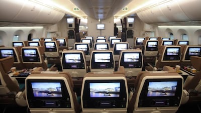 The Economy Smart Seats on Etihad Airways' Boeing 787, which feature the unique ‘fixed wing’ headrest on each seat. Lee Hoagland / The National