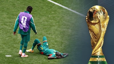 occer Football - FIFA World Cup 2026 - Round of 32 - Belgium v Senegal - Seattle Stadium, Seattle, Washington, U. S. - July 1, 2026 Senegal's Pathe Ciss looks dejected after the match as Senegal are eliminated from the World Cup REUTERS / Lee Smith