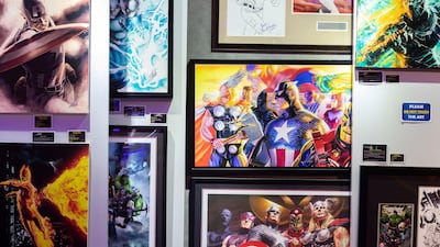 Senior operations manager Ian Eleria suggests collectors invest in original artwork. Chris Whiteoak / The National