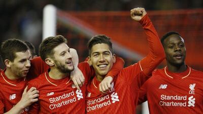Football Soccer - Liverpool v Manchester City - Barclays Premier League - Anfield - 2/3/16Liverpool's Roberto Firmino celebrates scoring their third goalReuters / Phil NobleLivepicEDITORIAL USE ONLY. No use with unauthorized audio, video, data, fixture lists, club/league logos or "live" services. Online in-match use limited to 45 images, no video emulation. No use in betting, games or single club/league/player publications. Please contact your account representative for further details.