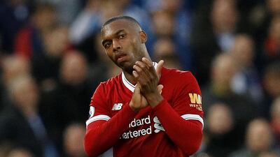 Liverpool's Daniel Sturridge applauds the fans as he is substituted off against Huddersfield at Anfield. The striker had set Liverpool on their way to a 3-0 win with a well-taken goal. Phil Noble / Reuters