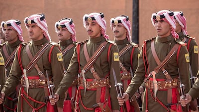 Soldiers of the Royal Guard of Honor stand guard. EPA