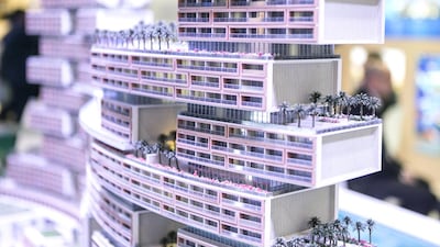 Above, a scaled version of a property development at Atlantis One&Only’s stand at Arabian Travel Market. Reem Mohammed / The National