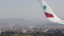 The view from a Middle East Airlines plane shows smoke rising after Israeli strikes in Beirut's southern suburbs. Reuters
