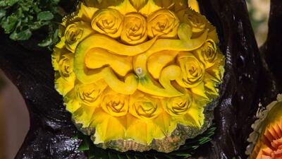 A carved pumpkin is displayed during a fruit and vegetable carving competition in Bangkok. Robert Schmidt / AFP