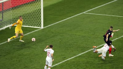 Ivan Perisic scores his side's first goal. AP Photo / Thanassis Stavrakis