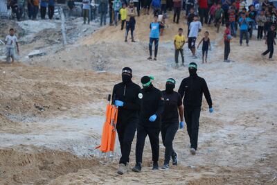 Hamas operatives on Tuesday retrieved a body found in a tunnel in Khan Younis. AFP