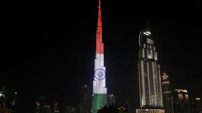 The Burj Khalifa, the world's tallest building, displays the flag of India in Dubai, United Arab Emirates, Saturday, Feb. 10, 2018. Indian Prime Minister Narendra Modi arrived in the UAE on Saturday night as part of a tour of the Middle East. (AP Photo/Jon Gambrell)