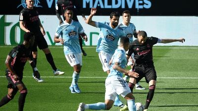 Karim Benzema scores Real's opener. AFP