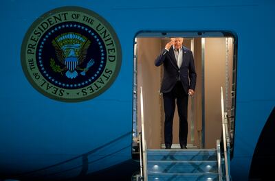 President Joe Biden returns a salute as he boards Air Force One for a trip to Israel and Saudi Arabia. AP