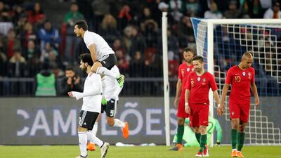 Mohamed Salah, left, scored the opening goal for Egypt before Cristiano Ronaldo scored twice to give Portugal a late victory in Zurich. Arnd Wiegmann / Reuters