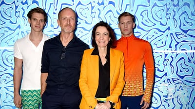 Designers Adam Brown and Laudomia Pucci flanked by models wearing pieces from their collection. Courtesy Pucci