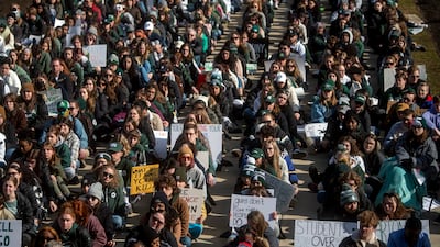 More than 1,000 Michigan State University students protest at the Capitol in Lansing, Michigan, one week after a gunman killed three students and injured five others. AP
