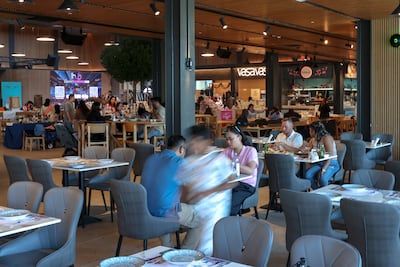 Flavours Hub by Creative Connect was inspire by Singapore's famous hawker centres. Victor Besa / The National