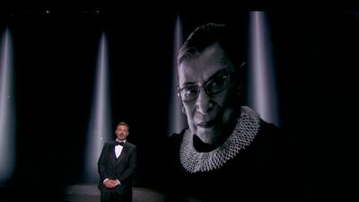 TV host Jimmy Kimmel stands before a photo of Ginsburg during the 72nd Primetime Emmy Awards ceremony, held online on September 20, 2020. AFP