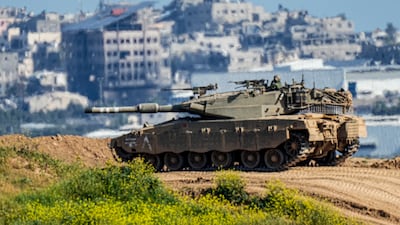 An Israeli tank moves along the border with Gaza on March 10, 2024. AP