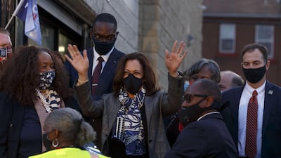 US Democratic Vice Presidential nominee Kamala Harris waves to supporters outside the 14th congressional district office distribution center on September 22, 2020, in Detroit, Michigan. AFP