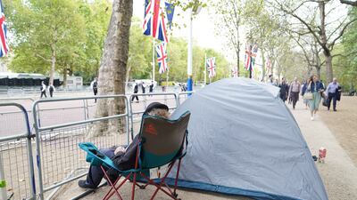 People start to camp on The Mall ahead of Queen Elizabeth's coffin being taken from Buckingham Palace on Wednesday afternoon by procession on a Gun Carriage to the Palace of Westminster. PA