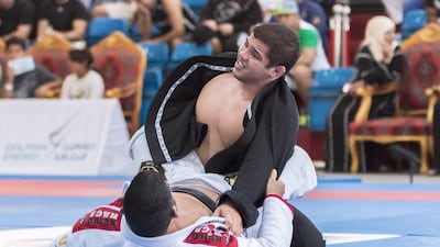 Jose Junior is about to celebrate after pinning down his more fancied opponent Ricardo Evangelista. Courtesy Max Buzin / Palm Sports