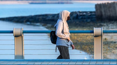 Walking the Corniche in Abu Dhabi. Victor Besa/The National