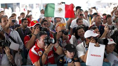Fans come from all over the world to see the world's best drivers. Christopher Pike / The National