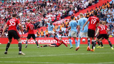 Jeremy Doku of Manchester City pulls one back. Getty Images