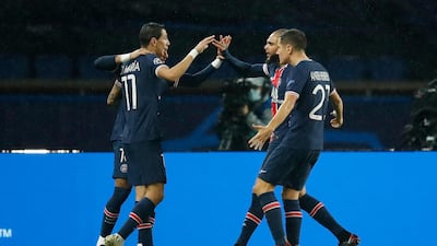 Paris St Germain players celebrate after Manchester United's Anthony Martial scored an own goal. Reuters