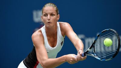Karolina Pliskova of Czech Republic hits a return against Angelique Kerber. Timothy A Clary / AP Photo
