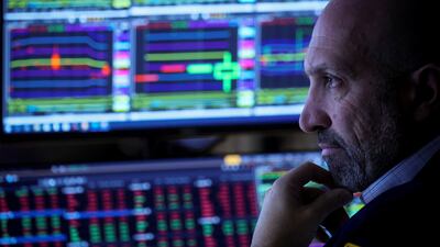 A trader on the floor of the New York Stock Exchange. Energy futures are volatile as talks continue over a price cap on Russian oil. Reuters