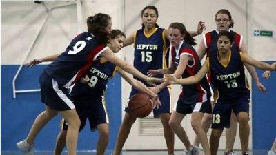 Dubai College, in the blue with red trim jerseys, fell to host Repton School in their under 15 finals match.