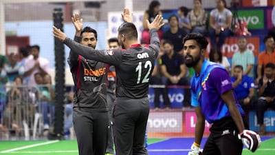 Isuru Umesh of the UAE takes a wicket during the game between the UAE v Malaysia in the W.I.C.F Indoor Cricket World Cup in 2017. Chris Whiteoak / The National