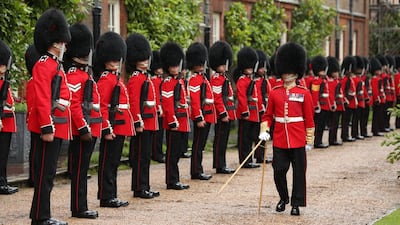 A Guard of Honour of the Coldstream Guards for French president Emmanuel Macron as he arrives at Clarence House. Getty Images