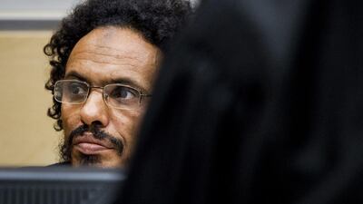 Ahmad Al Mahdi Al Faqi waits in the court room for his initial appearance at the International Criminal Court in The Hague. (AP Photo/Robin van Lonkhuijsen)