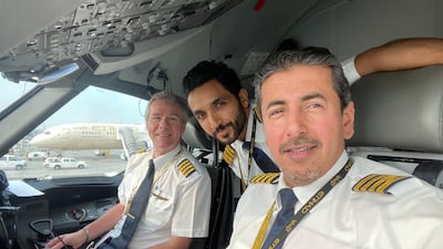 Capt Abdulla Obaid led the flypast over Yas Marina Circuit on Sunday. Pictured with Capt Mohammed Tamimi and Capt Henry before takeoff. Courtesy Capt Abdulla Obaid