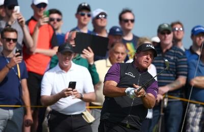 Phil Mickelson is one of the over-40 players with a chance to win the British Open title this year. Dave Thompson / AP Photo
