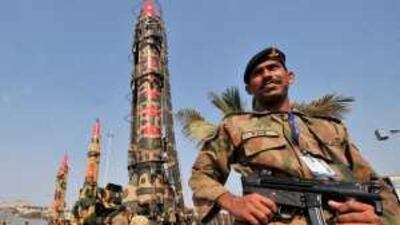 Pakistani army soldiers guard nuclear-capable missiles at the International Defence Exhibition in Karachi last November.