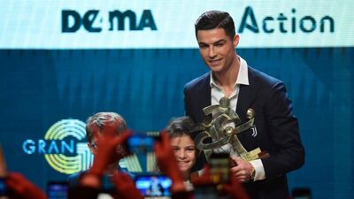Cristiano Ronaldo receives his award for Best Player at the Gran Gala del Calcio 2019 ceremony. AFP