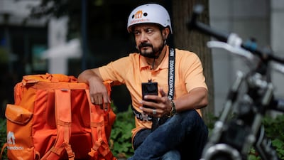 Sayed Sadaat sits with his gear in Leipzig, Germany. Reuters