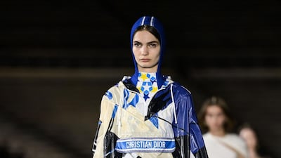 A model walks the runway during the Dior Cruise show 2022 at Panathenaic Stadium on June 17, 2021 in Athens, Greece. AFP