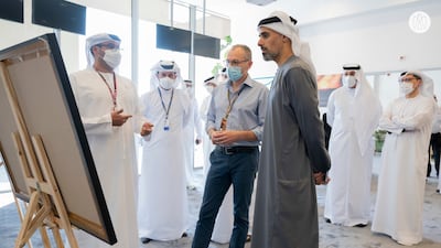 Sheikh Khaled discusses the remodelled Yas Marina Circuit with officials.
