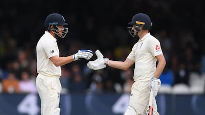 Jonny Bairstow, left, and Chris Woakes put on 189 for the sixth wicket for England in the second Test against India. Getty Images