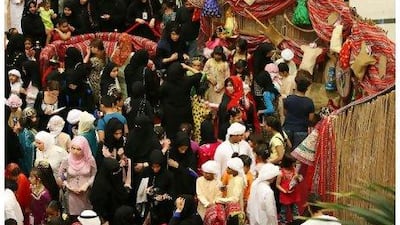 Youngsters mingle with their families to celebrate Hag al Leila at Mirdif City Centre.
