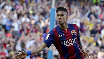 Barcelona's Neymar celebrates his goal against Real Sociedad during their Primera Liga match at Nou Camp stadium in Barcelona, Spain, May 9, 2015. REUTERS/Gustau Nacarino