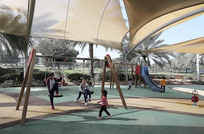 Children playing in the kids play area at the Yas Gateway Park on Yas Island in Abu Dhabi. ( Pawan Singh / The National )