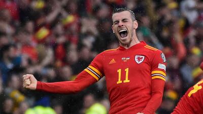 Gareth Bale celebrates after Wales qualified for the World Cup finals. Reuters