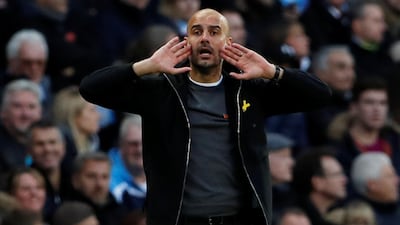 Manchester City manager Pep Guardiola shouts instructions during the 3-1 win against Arsenal at Etihad Stadium. Lee Smith / Reuters
