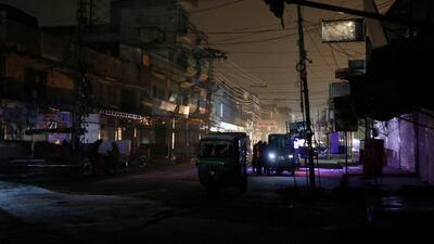 A dark street in Rawalpindi during a widespread power cut in Pakistan early on January 10, 2021. AP Photo