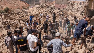 Villagers carry out a search and rescue mission in the rubble of destroyed buildings after the earthquake in Tafeghaghte, in El Haouz region. Bloomberg