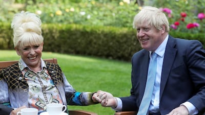 Prime Minister Boris Johnson has a cup of tea with television actress Dame Barbara Windsor during a meeting in London on September 2, 2019 in London, England. Barbara Windsor, who suffered from Alzheimers, met with the Prime Minister at 10 Downing Street to discuss dementia care. Getty Images